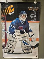 Full view of Cooper advertising poster with Mario Gosselin image