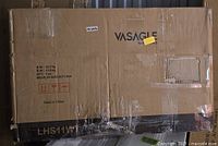 Sealed shipping carton showing Vasagle branding and item label