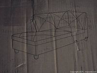 Box exterior showing line drawing of chaise