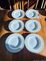 All six Rosenthal white 9" soup bowls displayed face-up