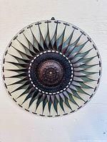 Full view of circular leather wall art