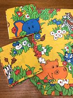 Flat sheet and pillowcases showing overall animal print design