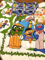 Group of all linens showing character, number and Bert patterns