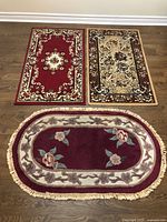 Three small rugs laid out on floor