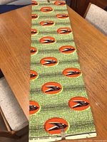 Full length view of folded 6-yard wax print fabric