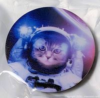 Front view of pop socket showing astronaut cat design