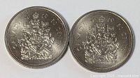 Both 2000 Canadian 50¢ coins, reverse view