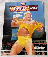 Full view of folded poster showing Hulk Hogan and logos