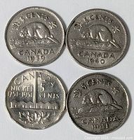 Front view of all four Canadian 5-cent coins showing dates 1939, 1940, 1941 and 1951 designs