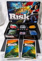 Opened box showing board, armies, dice, cards, rulebooks