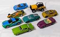 All eight diecast cars grouped