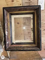 Front view of wooden frame showing molding and mat