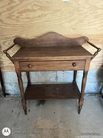 Front view of walnut wash stand