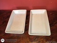 Top view of both white ceramic rectangular dishes