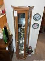 Front view of curio cabinet closed