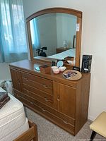 Front view of dresser with attached mirror