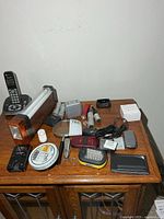 overview of electronics and accessories on wooden surface