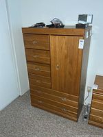 Front view showing drawers and cabinet