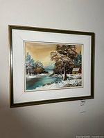 Full view of framed oil painting on wall