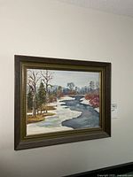 Full view of framed painting on wall