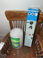 Tripod box and bubble wrap displayed together