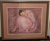 Full view of framed R.C. Gorman print leaning against wall