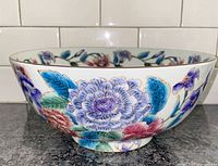 Side view showing floral design on bowl