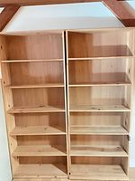 Front view of both bookcases showing height and shelving