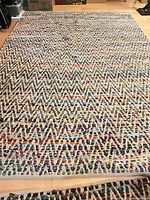 Large multicolor chevron rag rug overall view