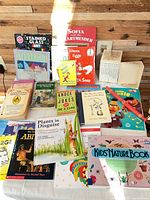 Tabletop view of all books and recorder