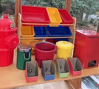 Overall lot showing shelf with bins, containers and organizers