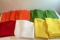 All fourteen panels grouped by color: red, white, yellow, orange, green