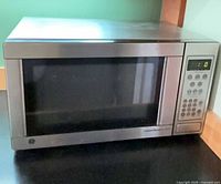 Front view of GE stainless microwave
