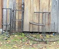 All three metal plant stands together outdoors