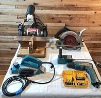 Overall lot with grinder, saw, planer, drill, charger, bit set