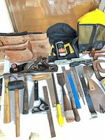 Overall layout of assorted hand tools on table
