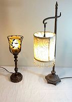Both lamps side by side showing relative heights and designs