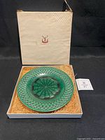 Plate in box with straw packing