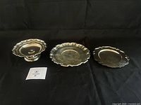 All three sterling silver trays side by side