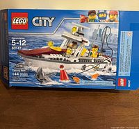 Front of LEGO City Fishing Boat box showing set 60147, 144 pieces