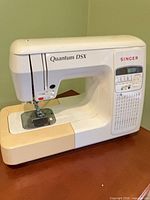 Front and side view of Singer Quantum DSX sewing machine