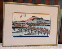 Full view of framed woodblock print in bamboo-style frame