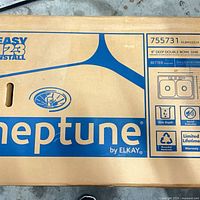 Box top showing Neptune by Elkay branding