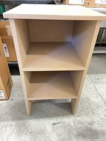 Front view showing two internal shelves and overall condition