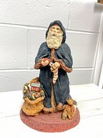 Front view of signed June McKenna 1986 Santa figurine