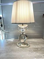 Full view of lamp showing shade, stem, crystals and base