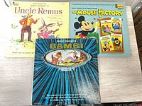 Front covers of all three Walt Disney vinyl records