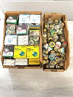 Two cartons containing boxed and loose plug fuses