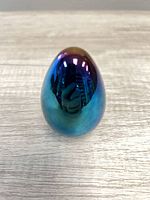 Front view of iridescent glass egg