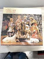 Front of retail box showing complete nativity scene